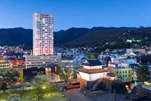Images Dated 13th April 2017: Kofu, Yamanashi, Japan downtown cityscape and corner castle tower at twilight