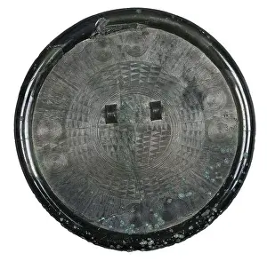 Korea Prints: Korea: Bronze mirror with intricate linear designs and two raised knobs
