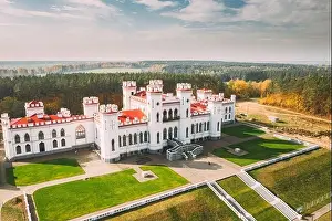Kosava, Belarus. Aerial Bird's-eye View Of Famous Popular Historic Landmark Kosava Castle. Puslowski Palace Castle. Landmark And Heritage