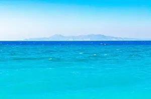 Dodecanese Prints: Kremasti beach with turquoise clear water and view to Turkey on Rhodes Greece