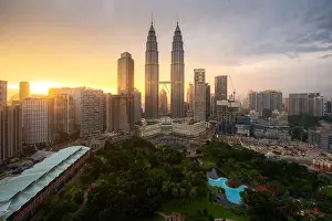 Kuala Lumpur city skyscraper and green space park with nice sky sunset at downtown business district in Kuala Lumpur. Malaysia. Malaysia tourism, mode