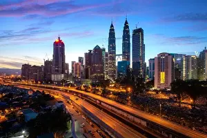 Kuala Lumpur city skyscraper and highway street with nice sky sunrise at downtown business district in Kuala Lumpur. Malaysia. Malaysia tourism, moder