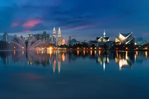 Kuala Lumpur Cityscape. image of Kuala Lumpur, Malaysia during sunset at Titiwangsa park with fountain