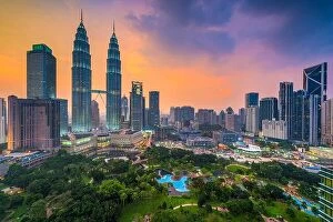 Images Dated 18th September 2015: Kuala Lumpur, Malaysia skyline at dusk over the park