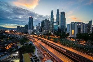Images Dated 19th February 2017: Kuala Lumpur skyline and skyscraper with highway road at night in Kuala Lumpur, Malaysia. Asia