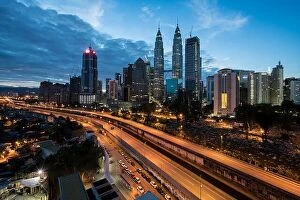 Images Dated 19th February 2017: Kuala Lumpur skyline and skyscraper with highway road at night in Kuala Lumpur, Malaysia. Asia