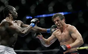 Cage Prints: Kyle Kingsbury, right, fights Razak Al-Hassan at UFC 104 at the Staples Center in Los Angeles