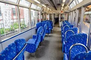 Kyoto Prints: Kyoto, Japan - June 26 2024 : Interior of Eizan Electric Railway 903 model train