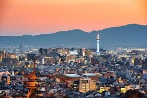 Images Dated 2nd April 2017: Kyoto, Japan skyline and towers at dusk