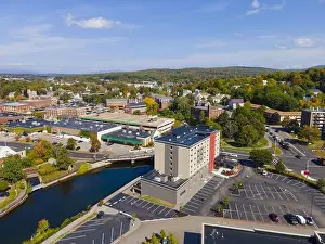 Laconia Prints: Laconia city center and Opechee Bay of Lake Winnipesaukee aerial view with fall foliage in downtown Laconia