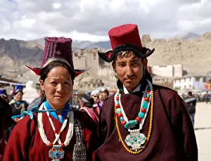 Himalayan Prints: a Ladakhi woman and man wearing Traditional Ladakhi Dress in Ladakh festivales
