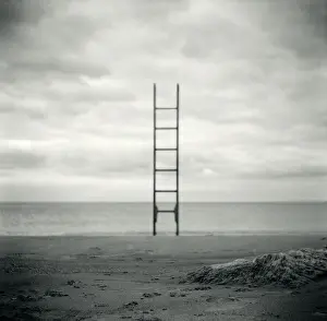 Leaving Prints: Ladder on Beach