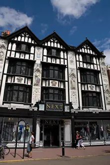 Kingston Prints: Next ladies clothes shop in a timber framed building Kingston Upon Thames Surrey UK