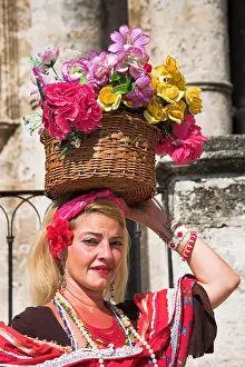 Posed Prints: Lady holding basket of flowers on her head