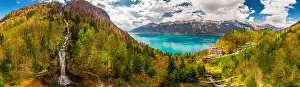 Lake Brienz and Giessbach Waterfall by Interlaken with the Swiss Alps covered by snow, Switzerland
