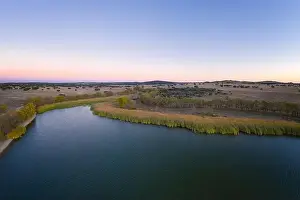 Alentejo Prints: Lake drone aerial view at sunset in Alentejo, Portugal
