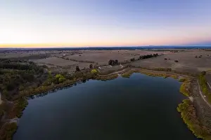 Lake drone aerial view at sunset in Alentejo, Portugal