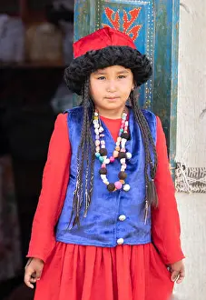 Nomad Prints: Lake Issyk-Kul, Kurgyzstan, 6th September 2018: local lady in full Kyrgyz outfit