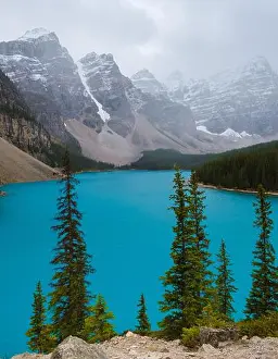 Moraine Prints: Lake moraine during a cold snowy day in Canada