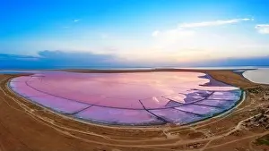 Mirrored Prints: Lake with pink healing salt water on a background of sunset and sunrise