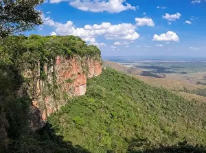 Landscape in Chapada dos Guimarães with lush green red cliffs, Brazil