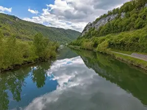Landscape with fields, mountains and river in France near Besancon in spring, Franche-Comte