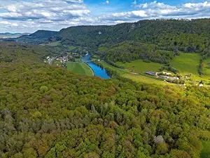 Landscape with fields, mountains and river in France near Besancon in spring, Franche-Comte