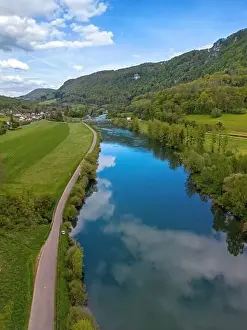 Landscape with fields, mountains and river in France near Besancon in spring, Franche-Comte