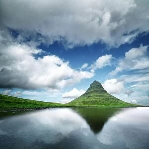 Images Dated 20th June 2016: Landscape with Kirkjufell mountain, clear lake and cloudscape in blue sky