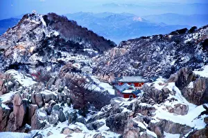 Snowfall Prints: Landscape of the Mount Tai or Taishan Mountain covered with snow after a snowfall in Tai'an city