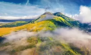 Landscape photography. Foggy morning view from flying drone of Breska valley