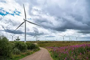 Green Energy Prints: Landscape photography of wind turbine; windmill; wind power; power generation; electricity; industry; innovation; green