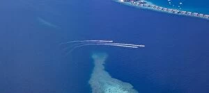 Images Dated 3rd February 2022: Landscape seascape aerial view over Maldives luxury resort villas with atoll sandbank island