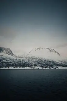 Brim Prints: Landscape shot of the snowy arctic Lyngen Alps in northern Norway