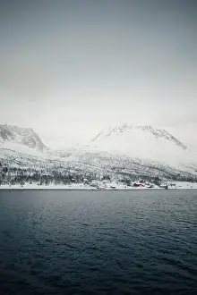 Brim Prints: Landscape shot of the snowy arctic Lyngen Alps in northern Norway in winter