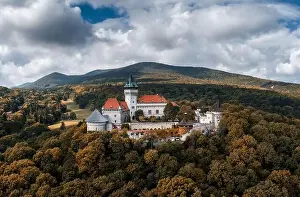 Landscape of Smolenice Castle in the Little Carpathians in early autumn with fall foliage colors