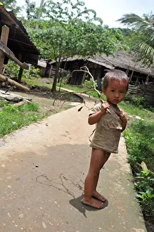 Lao boy in poor in Luang Prabang, Laos