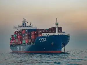 Container Ship Prints: A large, blue container ship off the coast of Hong Kong