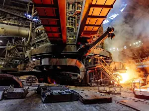 Spark Prints: Large electric blast furnace in metallurgical factory