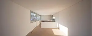 Oven Prints: Large and long empty room in a single-family apartment