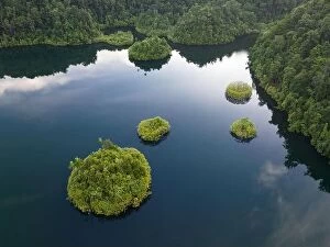Images Dated 18th April 2023: A large marine lake is found within beautiful limestone islands that rise from West Papua's seascape