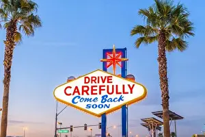 Clark County Prints: Las Vegas, Nevada, USA at the back of the Welcome to Las Vegas Sign reminding you to drive carefully and come back soon