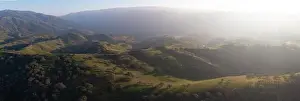 Late afternoon sunlight illuminates the beautiful hills and valleys found in Livermore, California. This area is not far east of San Francisco Bay