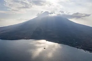 Ring Of Fire Prints: Late afternoon sunlight illuminates the Iliape volcano found just east of Flores