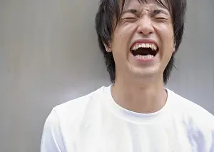 Shut Prints: Laughing young man