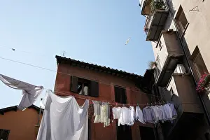 Bedclothes Prints: laundry washing hanging out to dry in Italian courtyard