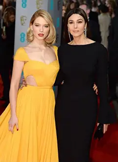 Eyes To Camera Prints: Lea Seydoux and Monica Bellucci attending the EE British Academy Film Awards 2015 held at the Royal Opera House