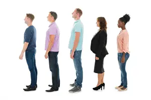 Businessmen Prints: Full length side view of creative people standing with manager in row against white background
