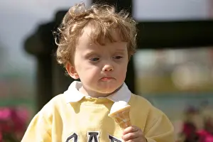 Ice Cream Prints: Lewis and his ice cream sitting on a park wall