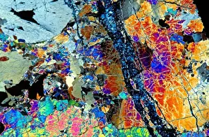 Lherzolite Rock thin section showing minerals through cross polarized light